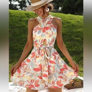 Size small. Floral halter.  Plenty of stretch for maternity